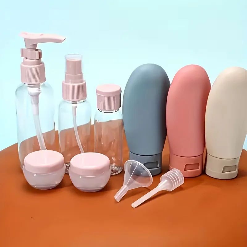 11-Piece Portable Refillable Travel Toiletries Bottle Set with Dispenser Pumps & Jars - Image 1
