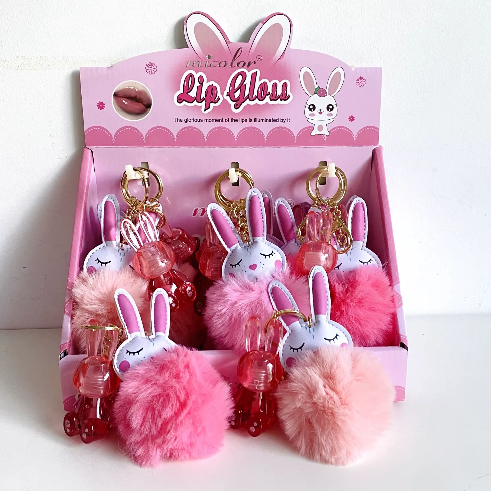 Sweet Rabbit Pom-Pom Lip Gloss Keychain for Hydrated Lips and Chic Accessory