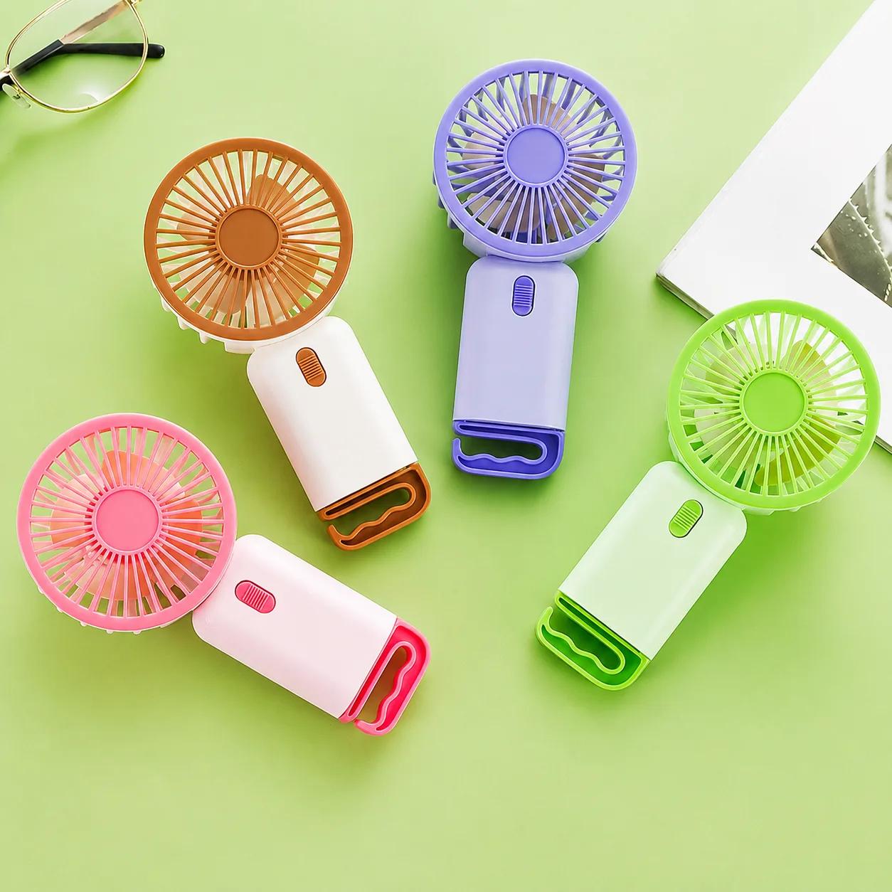 Portable USB Rechargeable Mini Handheld Fan with Stand — Personal Cooling for On-the-Go Comfort